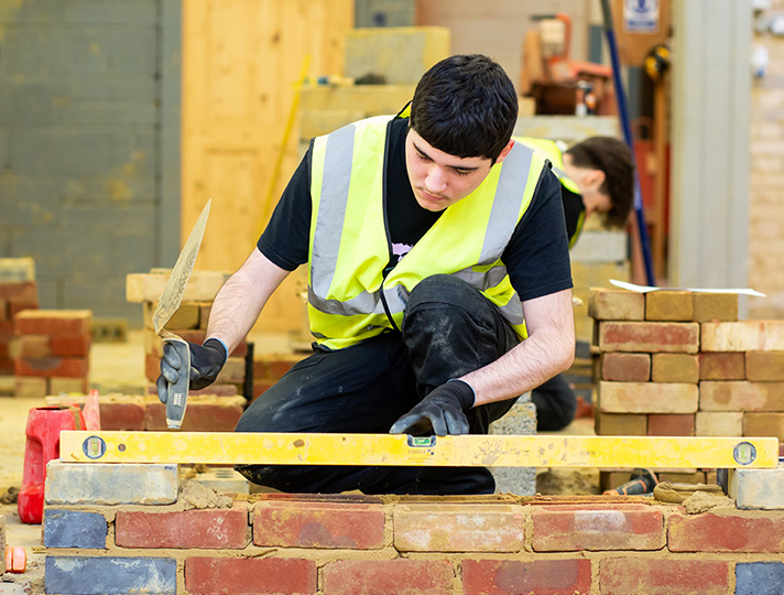 Students working in the bricklaying workshop