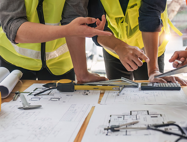 Students working on demolition plans