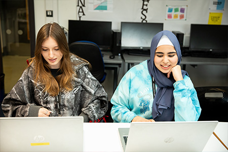 two students at a desk