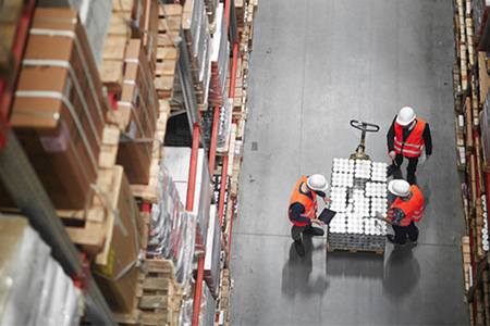 students learning in a warehouse